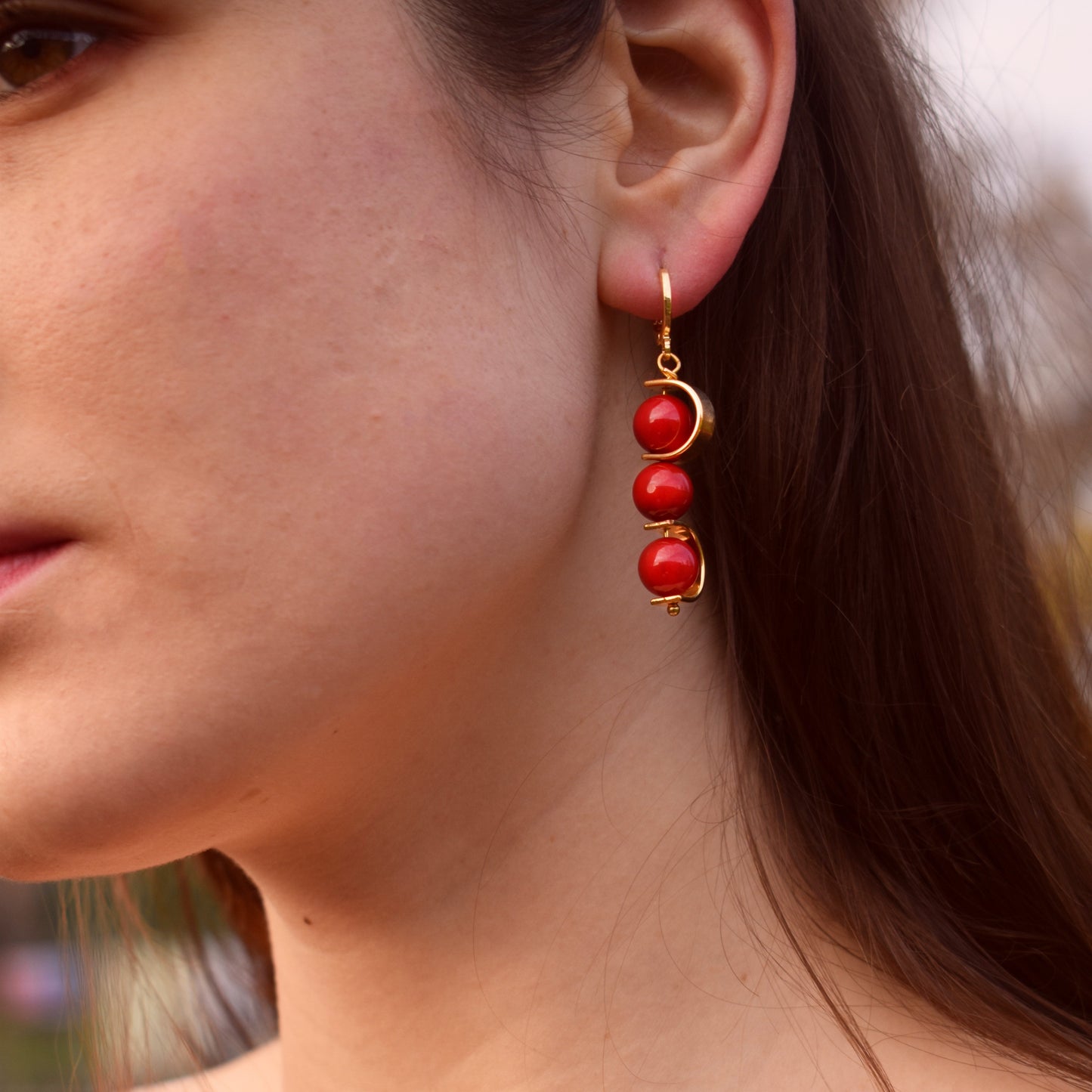 Coral gemstone asymmetric gold huggie earrings | by Ifemi Jewels Ifemi Jewels